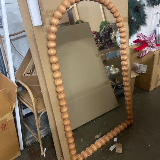Arched wood ball framed mirror